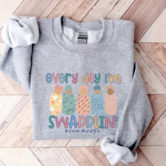 NICU Nurse Swaddle Shirt, Funny Nurse Gift for RNs, New Nurse Grad Gift