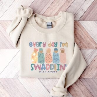 NICU Nurse Swaddle Shirt, Funny Nurse Gift for RNs, New Nurse Grad Gift